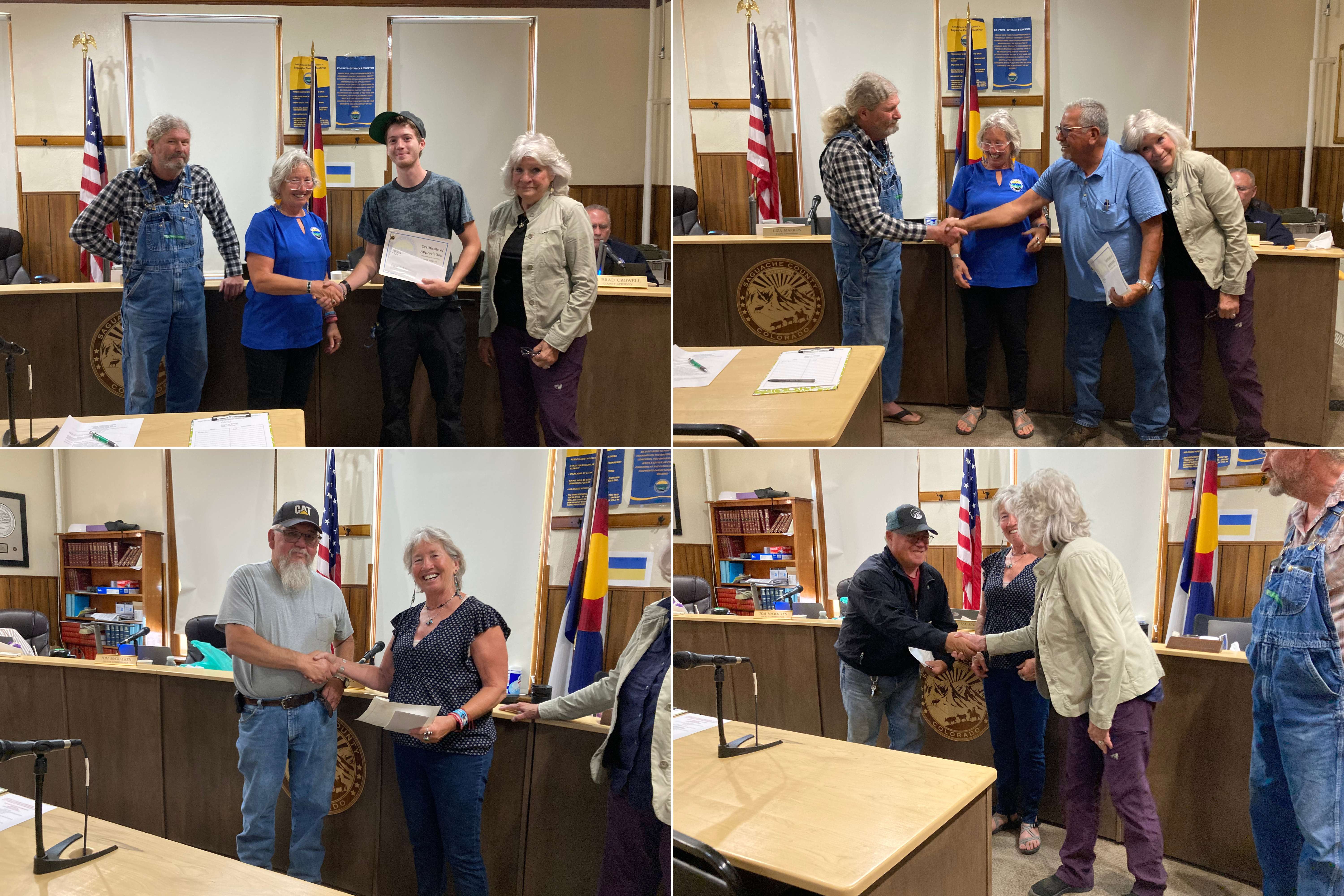 The image is a collage of four photographs taken in a room with flags and a wooden desk. Each photo captures a moment of agreement or transaction between pairs of employees shaking hands and exchanging awards.