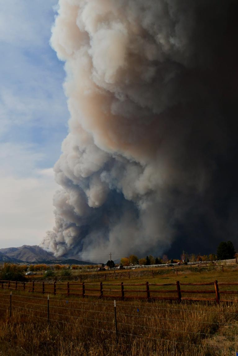 Photo by Malachi Brooks on Unsplash.  Taken on the day the calwood fire started from the peak to peak highway. Showing the smoke plume created from the fire after growing to 8000 acres within the first 5 hours.